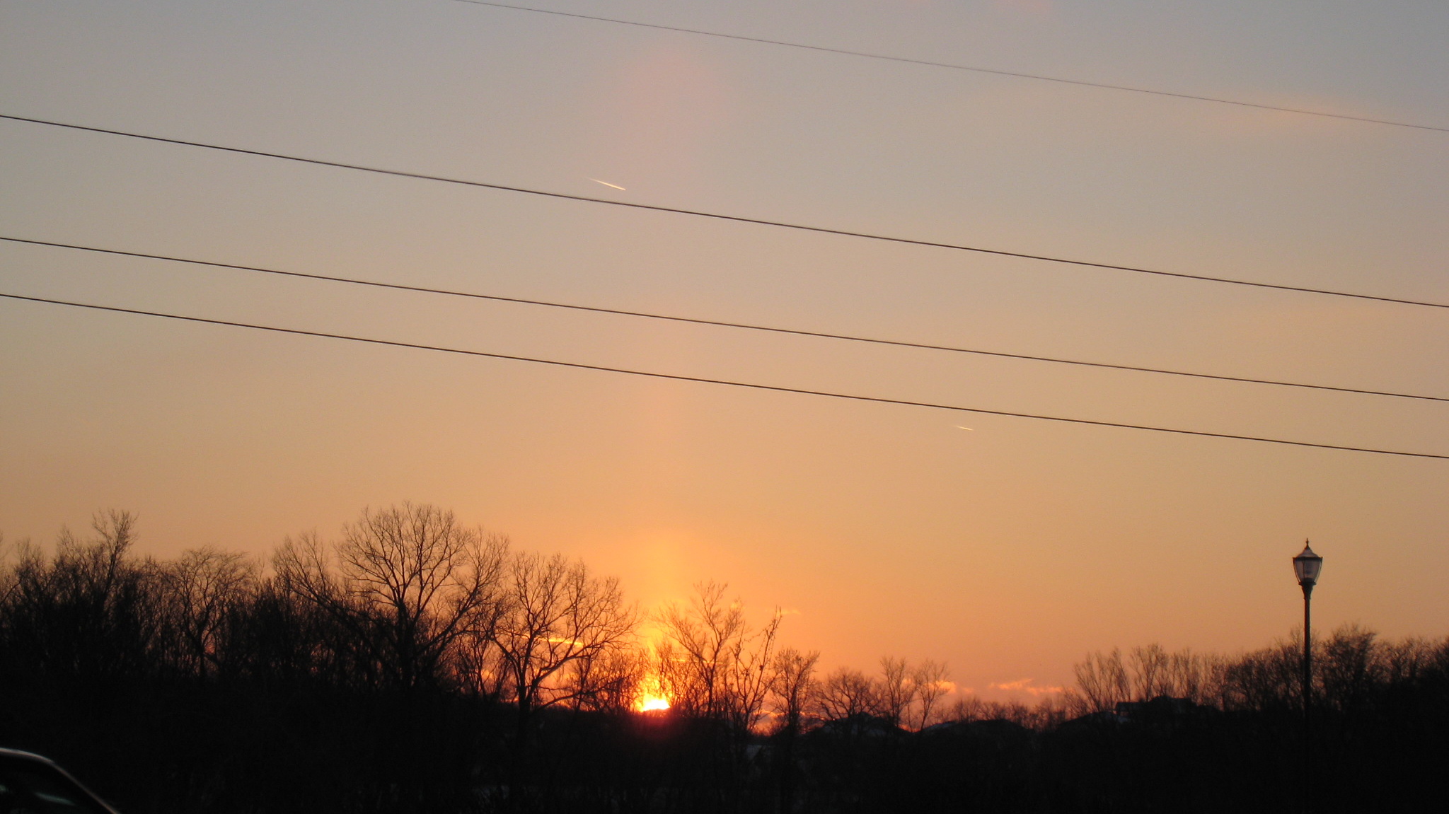 Sun setting in the college town of Iowa City